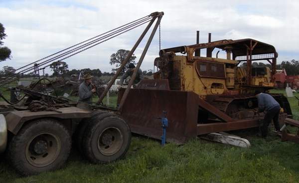 attaching the blade to the dozer